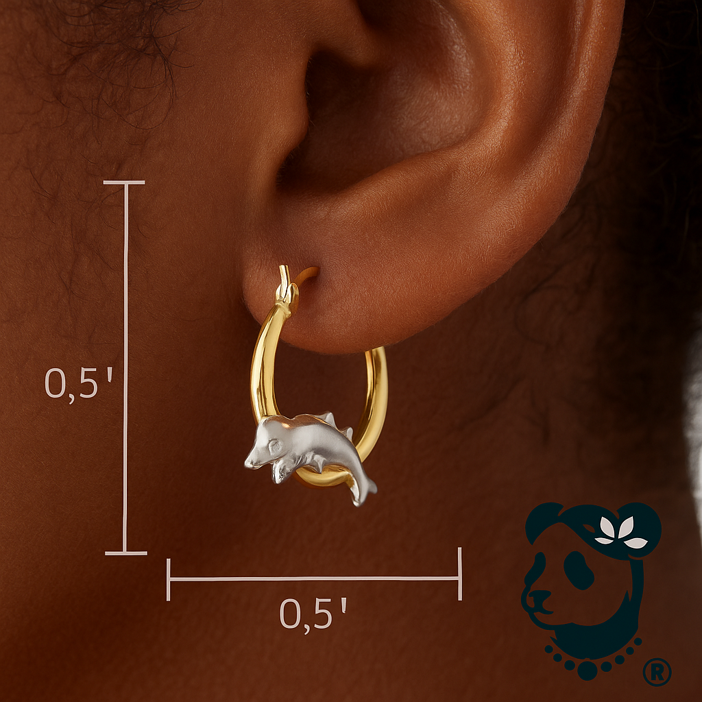 Gold and silver earring worn on an ear with measurement details