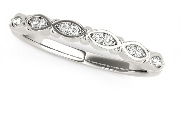 Silver ring with embedded diamonds on a white background