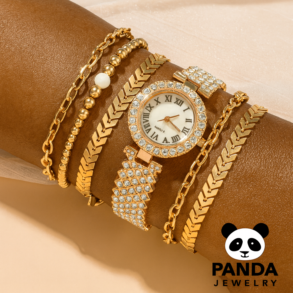 Gold jewelry set with a watch and bracelets on a person's wrist, featuring the Panda Jewelry brand.