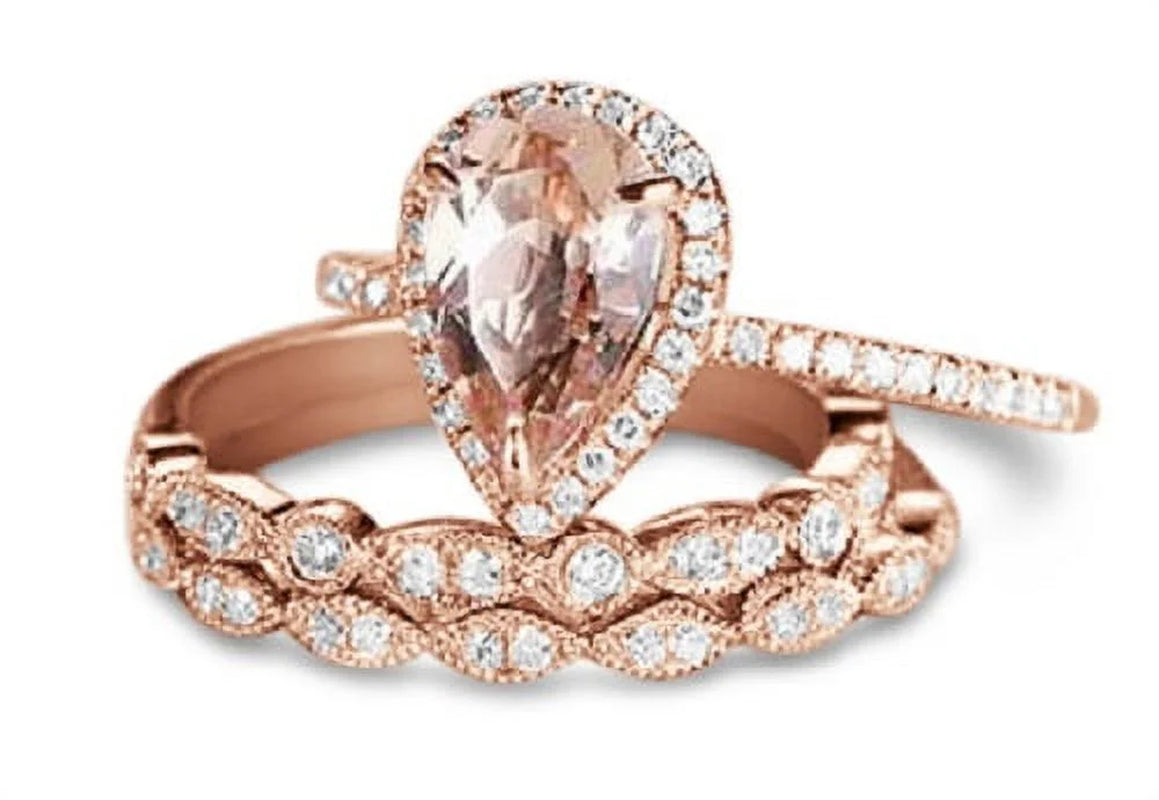 1.75 carat pear cut morganite bridal ring set in 18K rose gold with vintage-inspired diamond accents.