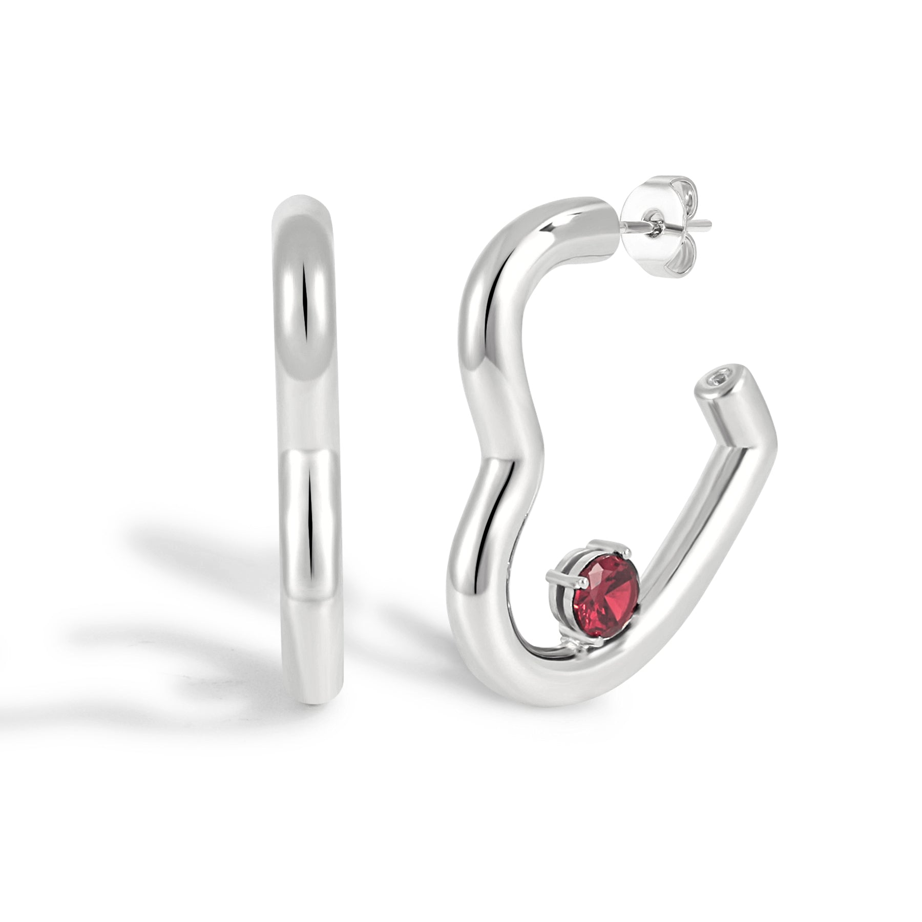 Silver hoop earrings with a red gemstone on a white background