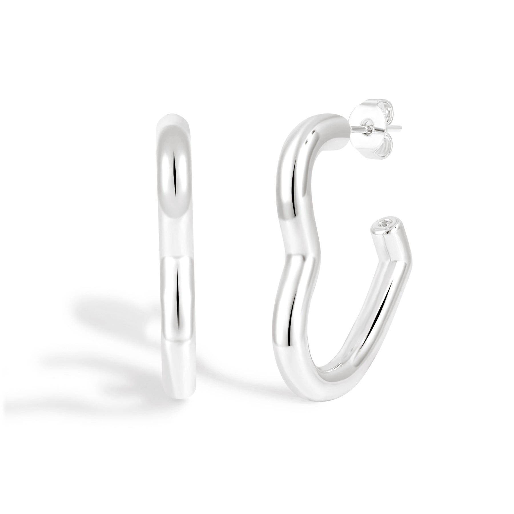 Silver hoop earrings on a white background