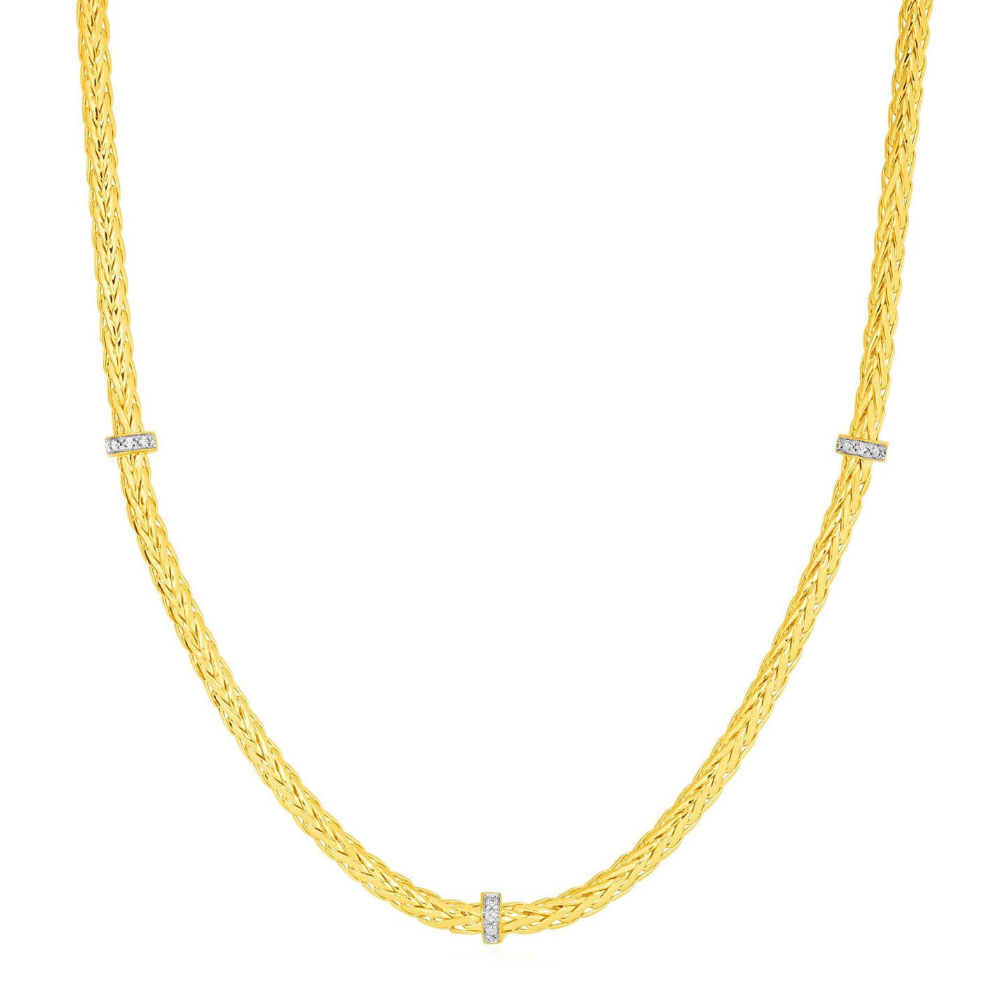 Gold necklace with diamond accents on a white background
