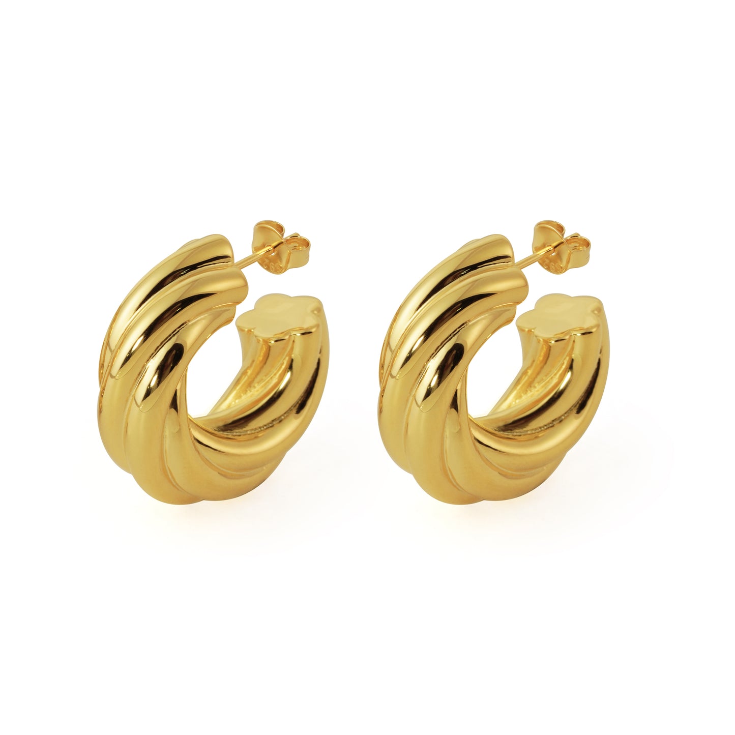 Gold hoop earrings on a white background