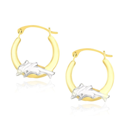 Gold hoop earrings with silver dolphin charms on a white background