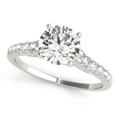 14K white gold diamond engagement ring with a round solitaire stone and a sparkling single-row band.