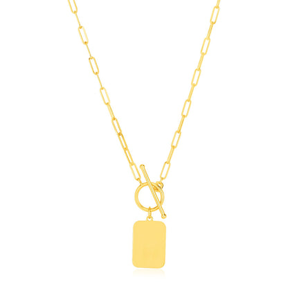 Gold necklace with a rectangular tag pendant on a white background