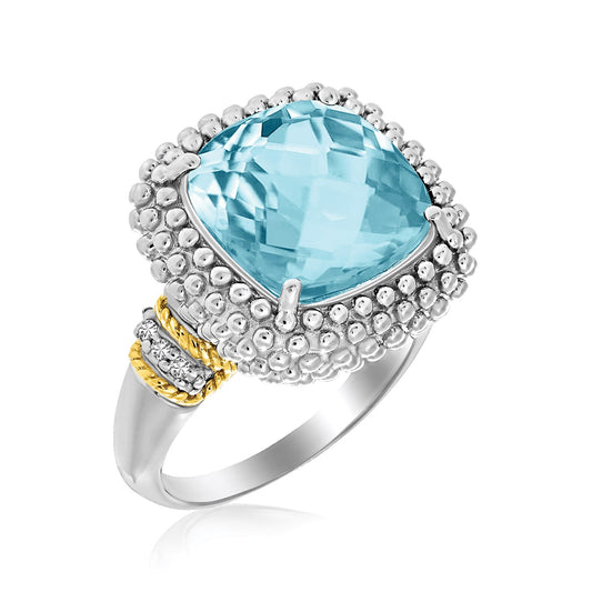Ring with a large blue gemstone and gold accents on a white background