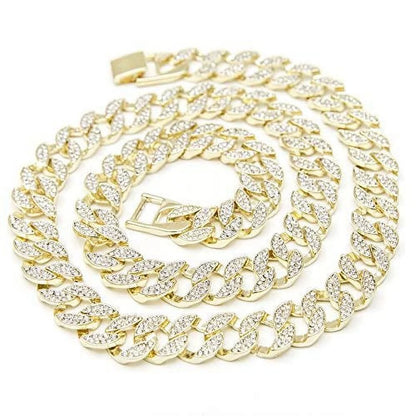 Gold chain necklace with clear stones on a white background