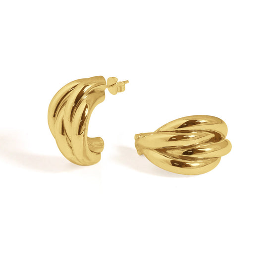 High-polish gold-tone twisted hoop earrings featuring a retro-inspired, elegant aesthetic.