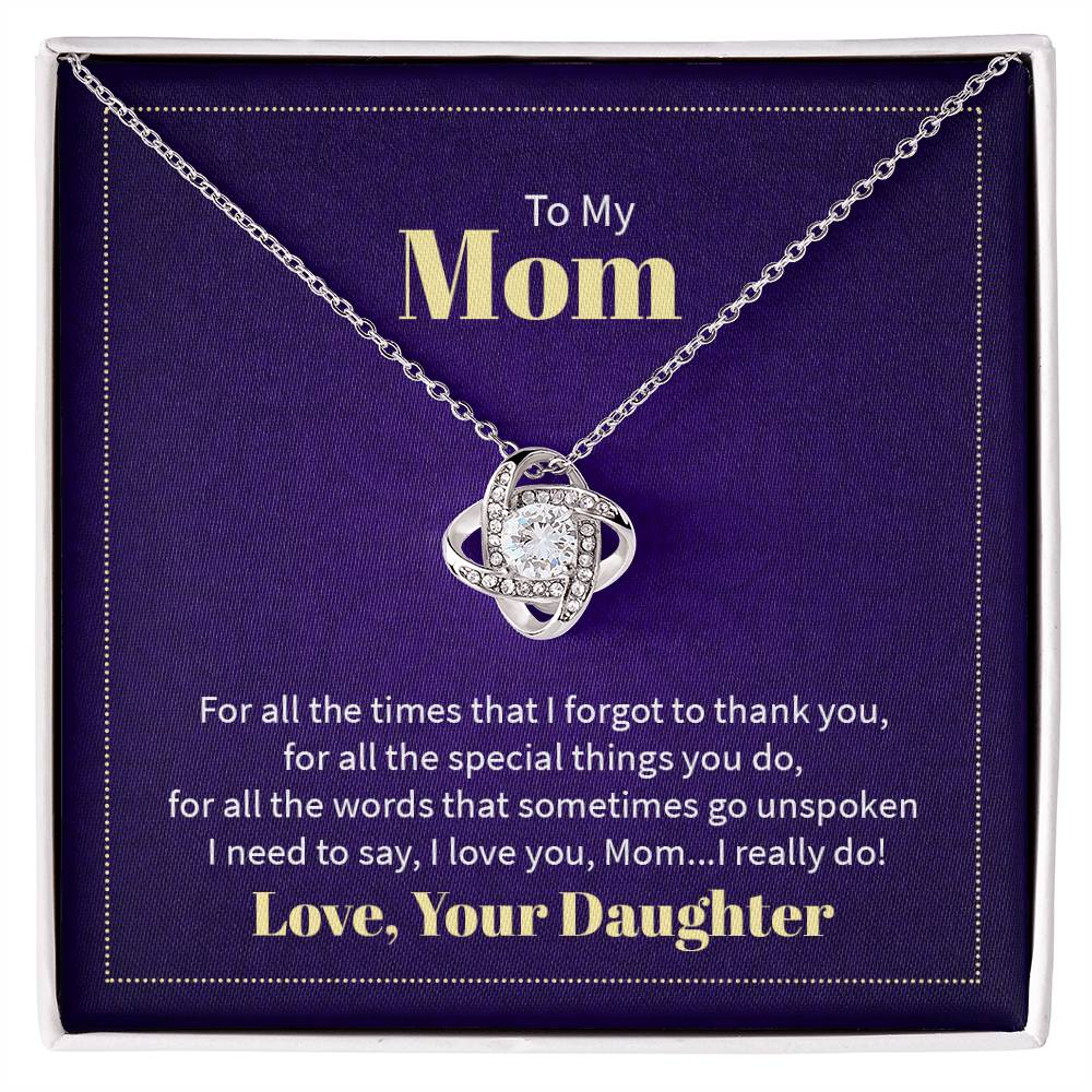 Timeless Love Knot Necklace with CZ crystals, symbolizing unbreakable bonds. Available in 14K white or 18K gold finish. Perfect gift for special occasions!