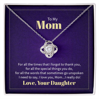 Timeless Love Knot Necklace with CZ crystals, symbolizing unbreakable bonds. Available in 14K white or 18K gold finish. Perfect gift for special occasions!