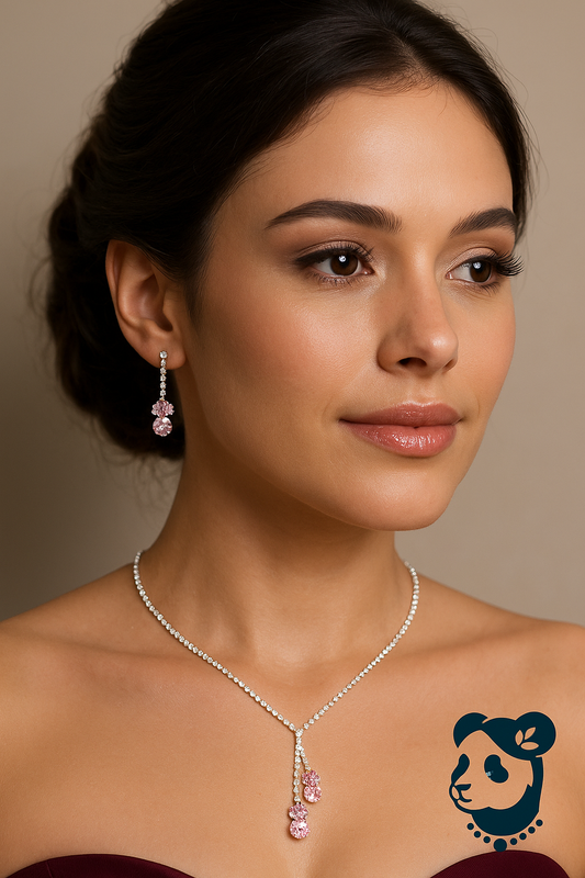 Woman wearing a necklace and earrings with a neutral background