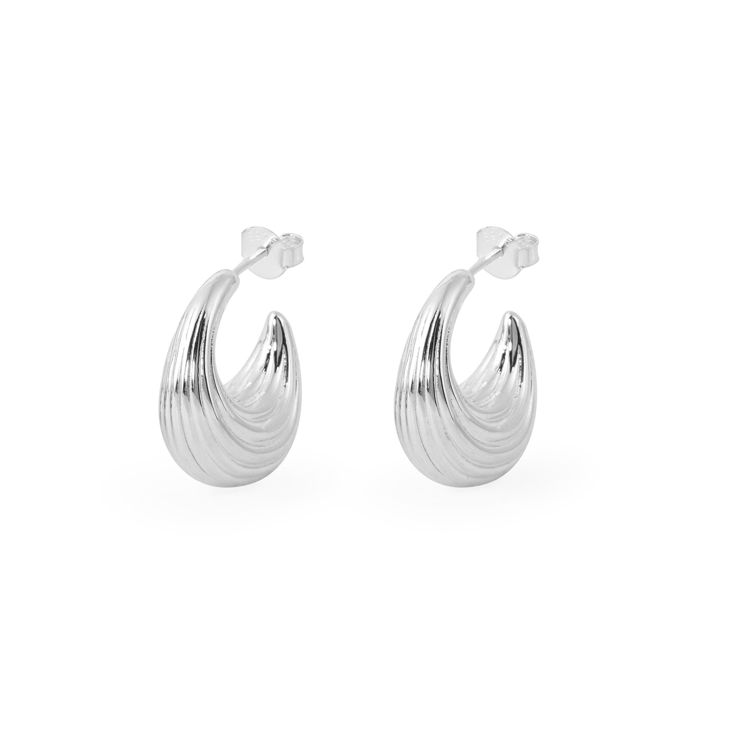 Silver hoop earrings on a white background