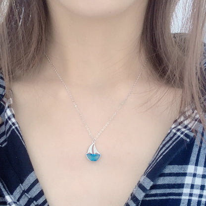 Sterling Silver Sailboat Necklace with Blue CZ Crystal – Nautical Jewelry