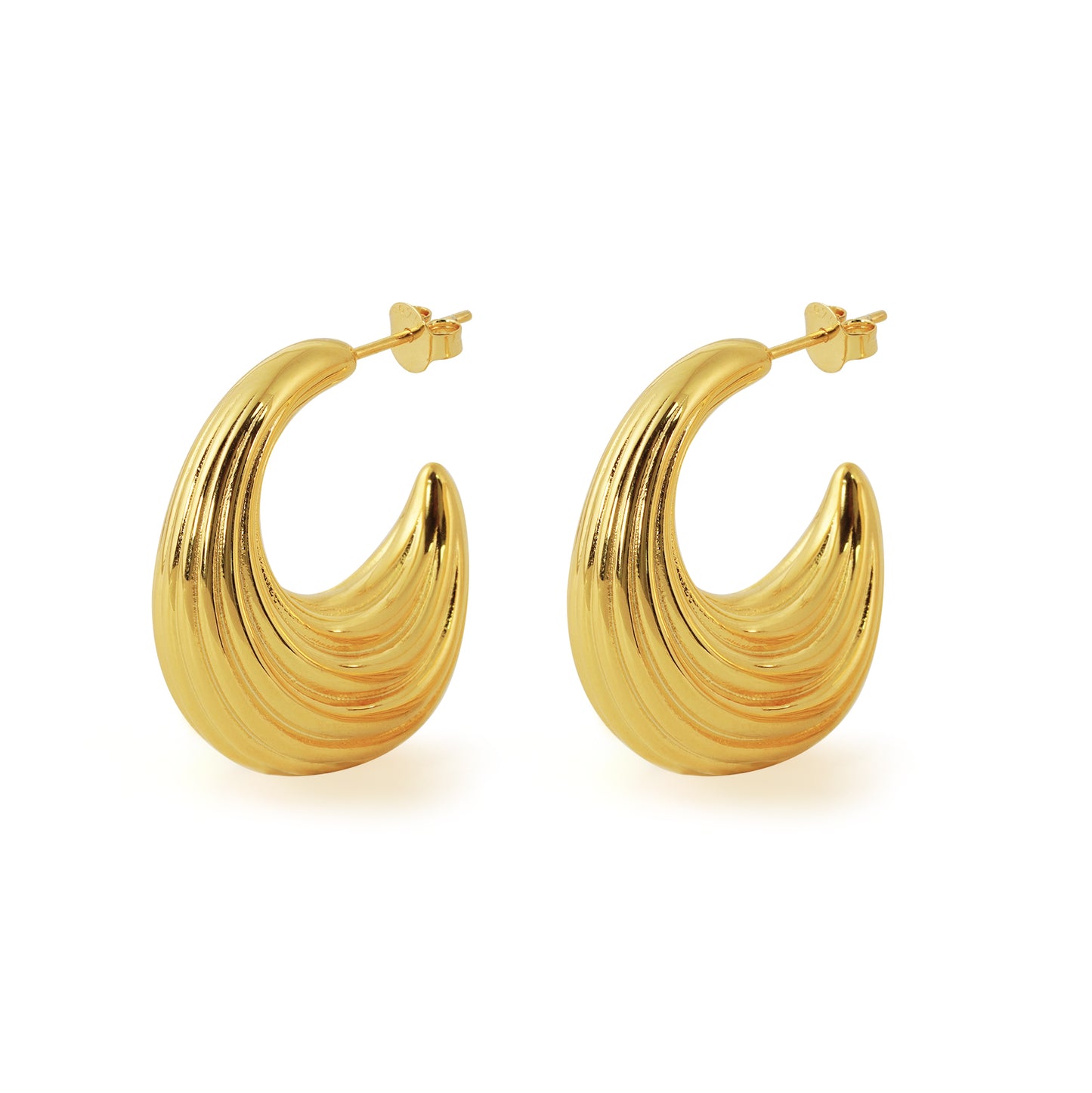 Gold hoop earrings on a white background