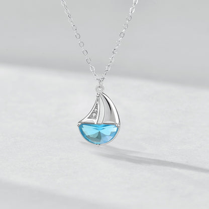 Sterling Silver Sailboat Necklace with Blue CZ Crystal – Nautical Jewelry