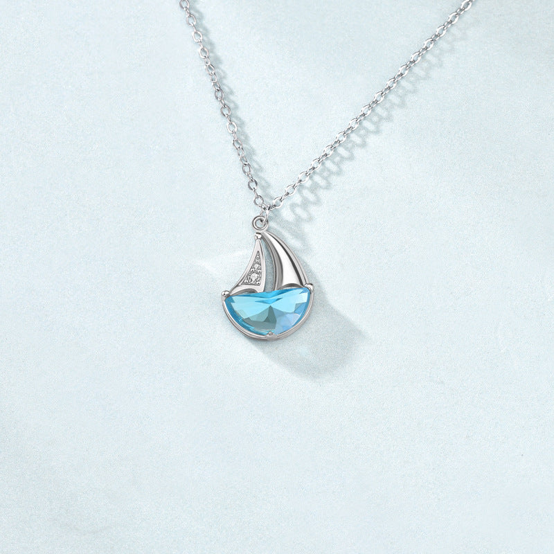 Sterling Silver Sailboat Necklace with Blue CZ Crystal – Nautical Jewelry