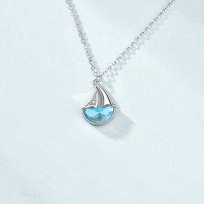 Sterling Silver Sailboat Necklace with Blue CZ Crystal – Nautical Jewelry