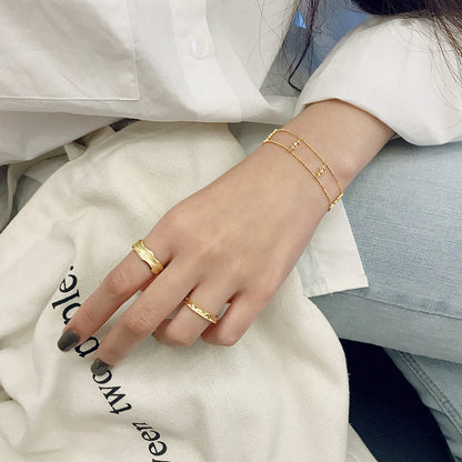 Elegant Gold Dollar Sign Bracelet – Double Chain with CZ Sparkle