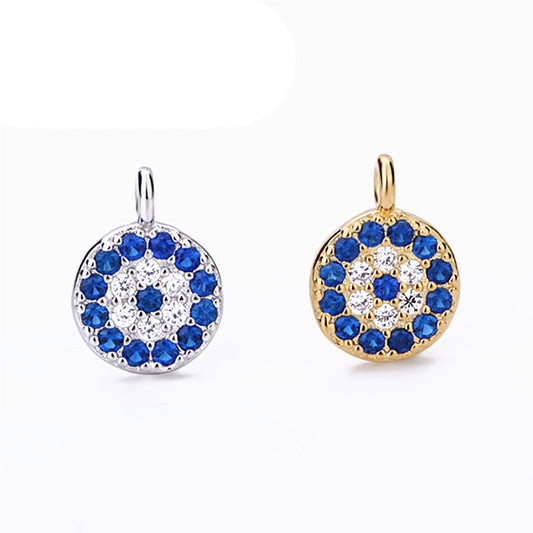 Blue and white CZ round evil eye pendant in gold and silver