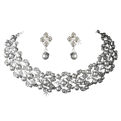 Jewelry set with necklace and earrings on a white background