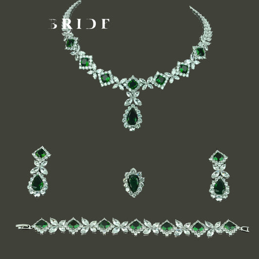 Luxurious 4-piece cubic zirconia wedding set with shimmering green and clear stones