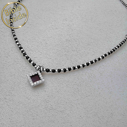 Faith-inspired hidden Bible charm necklace in silver and black – Christian jewelry for women