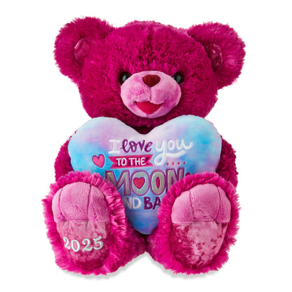 Close-up of a pink plush bear holding a tie-dye heart, featuring a loving message and date for a sweet, gift-worthy keepsake.