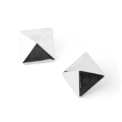 Pair of sterling silver geometric pyramid stud earrings with a bold, angular design.