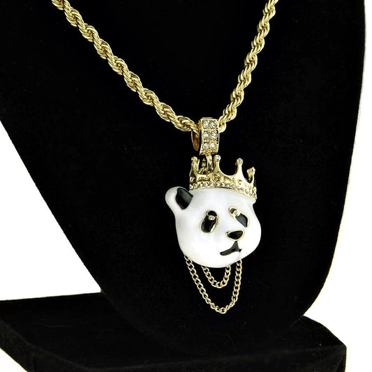 Person wearing gold panda necklace hip hop jewelry style.
