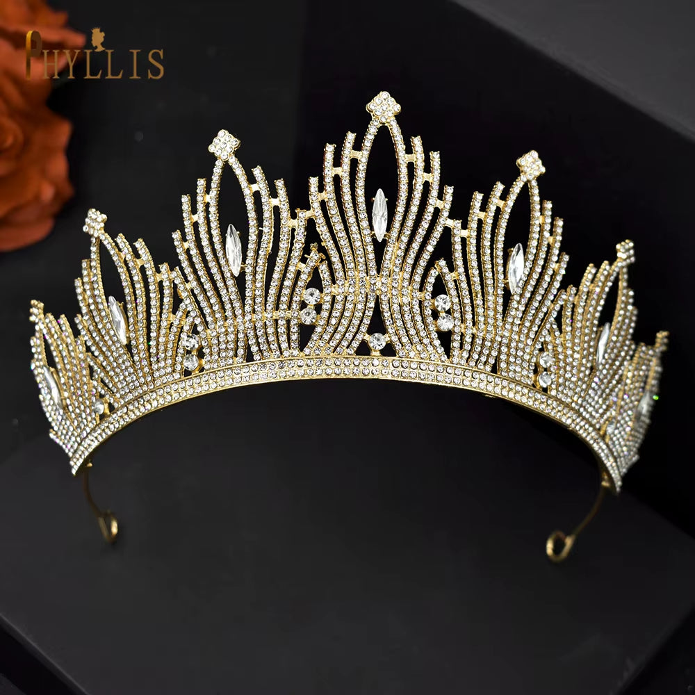 Elegant golden rhinestone tiara with vintage bridal design on black background