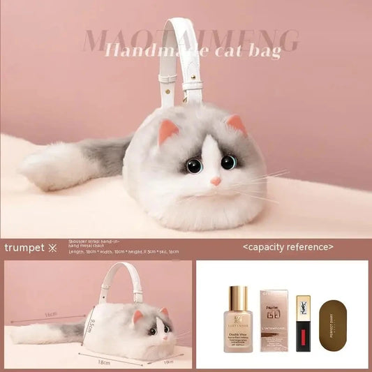 Handmade fluffy cat shoulder bag with big eyes and soft tail on pink background"