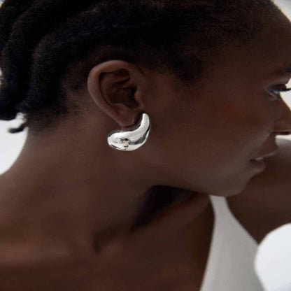 Sculptural silver stud earrings – Bold abstract statement jewelry for women