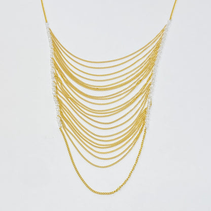 Multi-layered gold chain drop necklace with cascading arcs