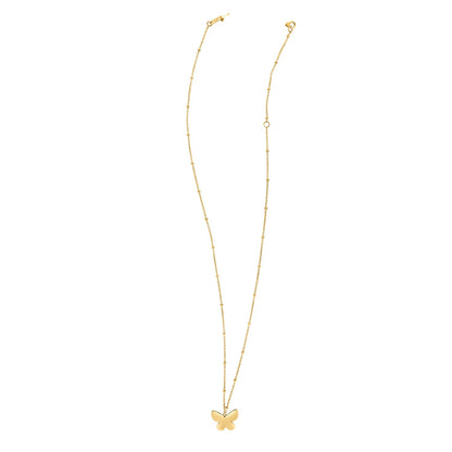 Gold butterfly necklace on a white background