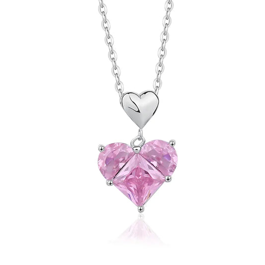 White gold necklace with trio pink heart gemstone pendant and silver charm