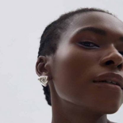 Polished silver triangle earrings – Unique fashion studs for everyday elegance