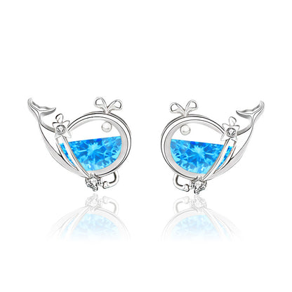 Sterling silver whale stud earrings with blue CZ gemstones