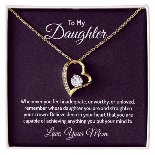 To My Daughter heart-shaped necklace with a sparkling cubic zirconia center, displayed in a gift box with a heartfelt message from Mom.