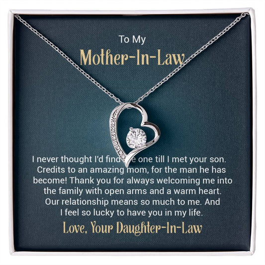 To My Mother-In-Law heart-shaped necklace with a sparkling cubic zirconia center, displayed in a gift box with a heartfelt message from a daughter-in-law.